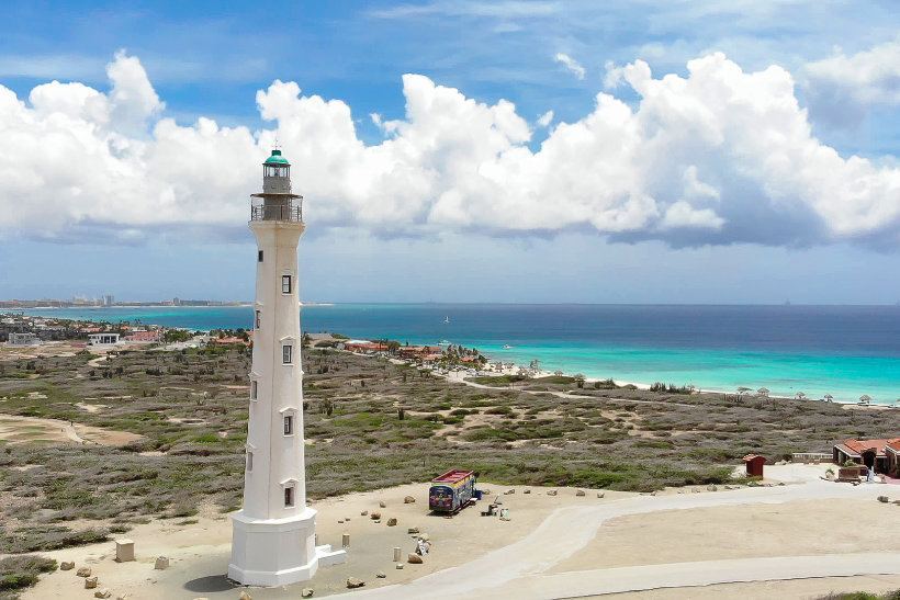California Lighthouse beneath a bright Aruba sky